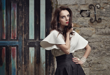 Fototapeta premium Portrait of a girl model in a beautiful dress.
