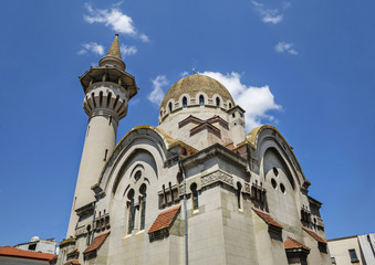 Fototapeta na wymiar The Great Mahmudiye Mosque (Moscheea Mare Mahmoud II) built in 1910 by King Carol I, famous architecture and religious monument in Constanta, Romania