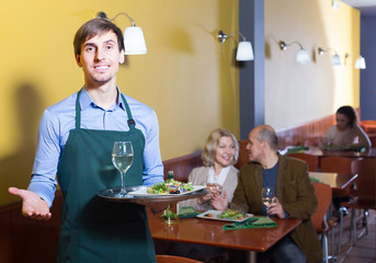 waiter working in restaurant