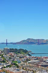 Fotobehang San Francisco: skyline e il Golden Gate Bridge visti attraverso il vetro della Coit Tower il 6 giugno 2010 © Naeblys