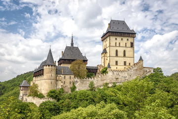 Fototapeta na wymiar Karlstein, Czech Republic - May 26, 2016: Karlstein Castle is a large Gothic castle founded in 1348 by King Charles IV, Holy Roman Emperor and King of Bohemia.