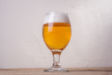 Beer glass on wood