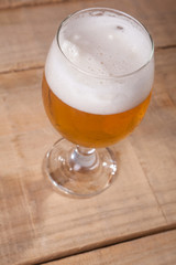 Beer glass on wood