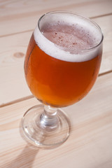 Amber ale on wood
