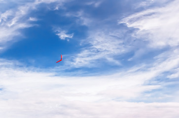 Fototapeta na wymiar Red boomerang in flight