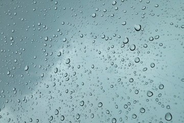 Raindrops on clear window.