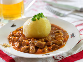 Potato dumplings with goulash