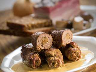 Meat rolls on plate