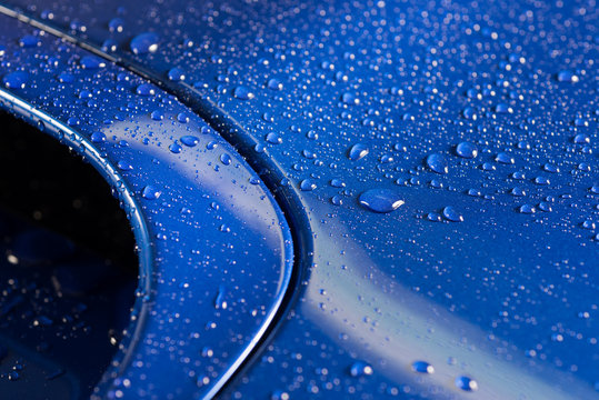 Fototapeta Car detailing series : Droplets on blue car bonnet