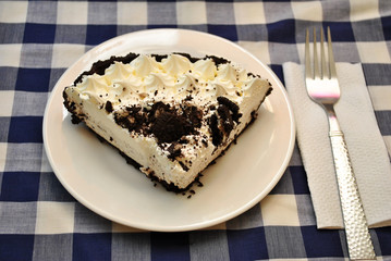 Whipped Cream Cookie Pie Served on a White Plate