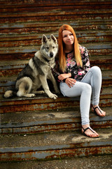 Lovely Woman Posing With a Wolf