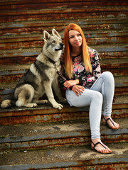 Lovely Woman Posing With a Wolf