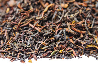 Background of dry black tea with flavors