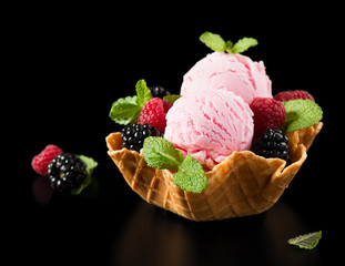 Dessert of ice cream and berries.