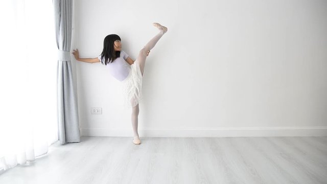 Happy Girl practice ballet dance at home