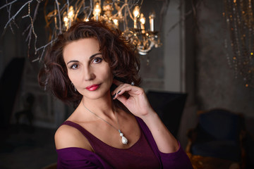 Gorgeous woman of 50 years in the studio