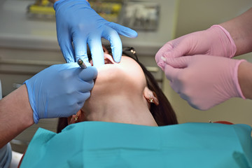 dentist conducting an operation