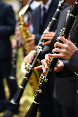 group of musicians playing the clarinet.