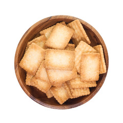 Mini coconut biscuit in wood plate isolated on white background