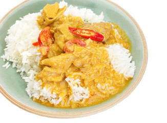 Red curry chicken and white rice on white background