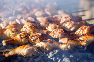 Cooking meat on the fire.