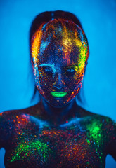 Girl colored fluorescent powder.