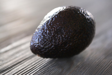 Fresh avocado on wooden background