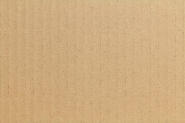 Fototapeta na wymiar brown striped cardboard texture background