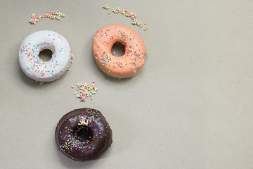 Donuts composition Place on the wooden floor A white background