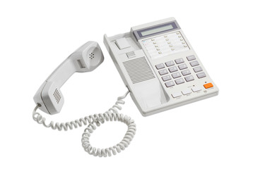 Landline telephone with push button dial on a light background
