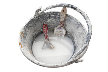 home improvement paint brushes in washing bucket