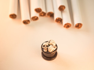 Cigarette and skull