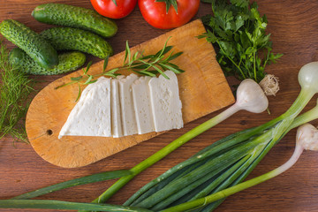 Vegetables on the table top with cheese