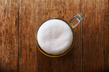 Glass of Beer on the Wooden Table
