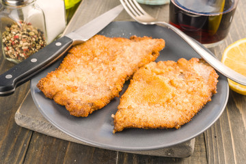 fillet breaded and fried veal; in dish