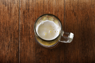 Glass of Beer on the Wooden Table