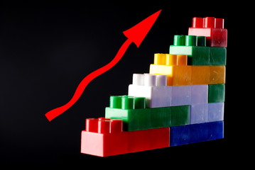 toy piramid with red arrow