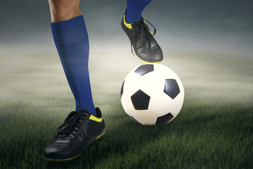 Feet's soccer player with a ball