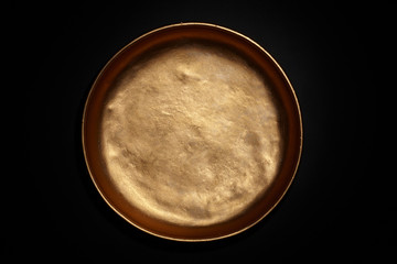 Copper plate in black background