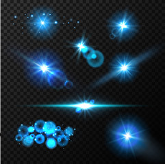 Realistic glow blue light effects. Lens flare set. Realistic glowing sparkles particles effects on dark transparent grid