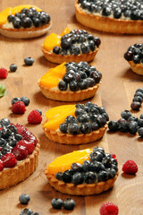Fruit tart dessert on wooden table