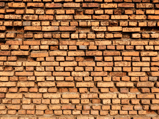 Background of vintage red brick wall pattern texture.