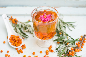 Healthy hot tea with a sea-buckthorn
