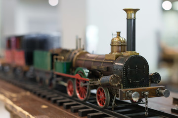 Fototapeta na wymiar Miniature model of vintage train with wagons.