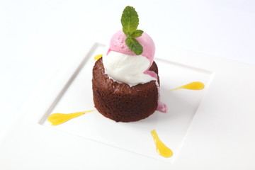 chocolate fondant with sauce and mint