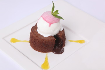 chocolate fondant with sauce and mint