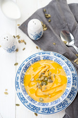 Pumpkin cream soup with sunflower seeds
