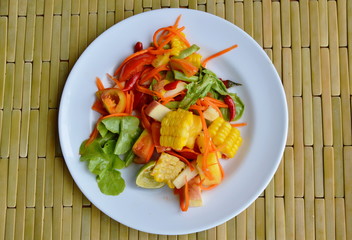 spicy mixed fruit and vegetable salad on dish