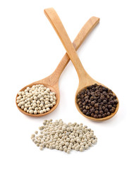 Wooden spoon and peppercorn on white background