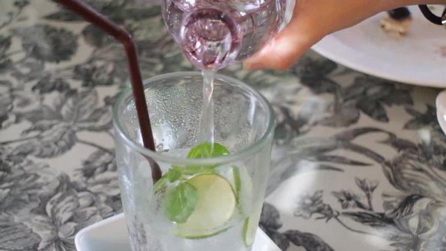 Refreshing lime juice soda drink, stock video